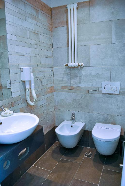 Koupelna v ubytování Hotel Alfonsina