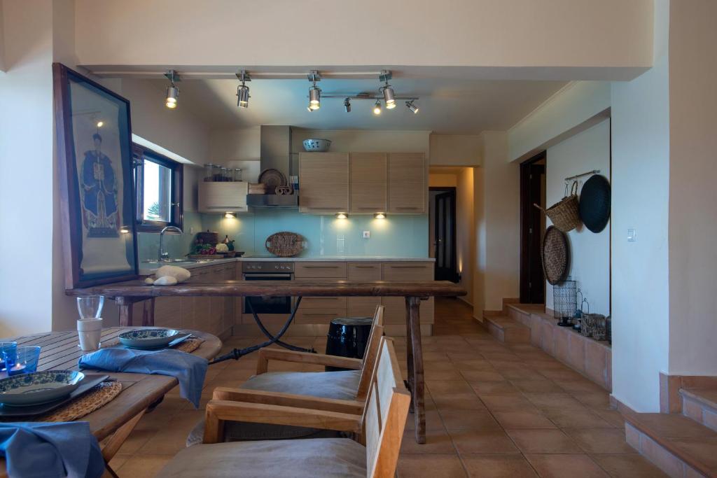 Kuchyň nebo kuchyňský kout v ubytování Studio Thea - Roxan Residence
