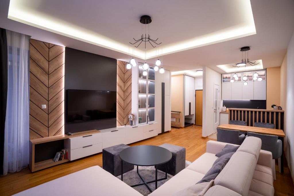 TV i/ili zabavni centar u objektu Apartman G8 Deluxe