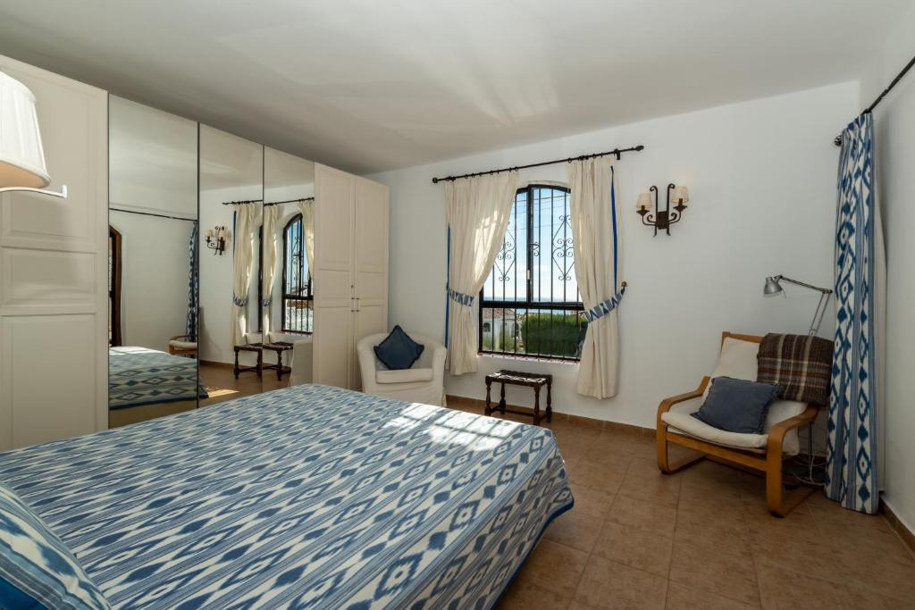 Postel nebo postele na pokoji v ubytování Las Lilas, Nerja
