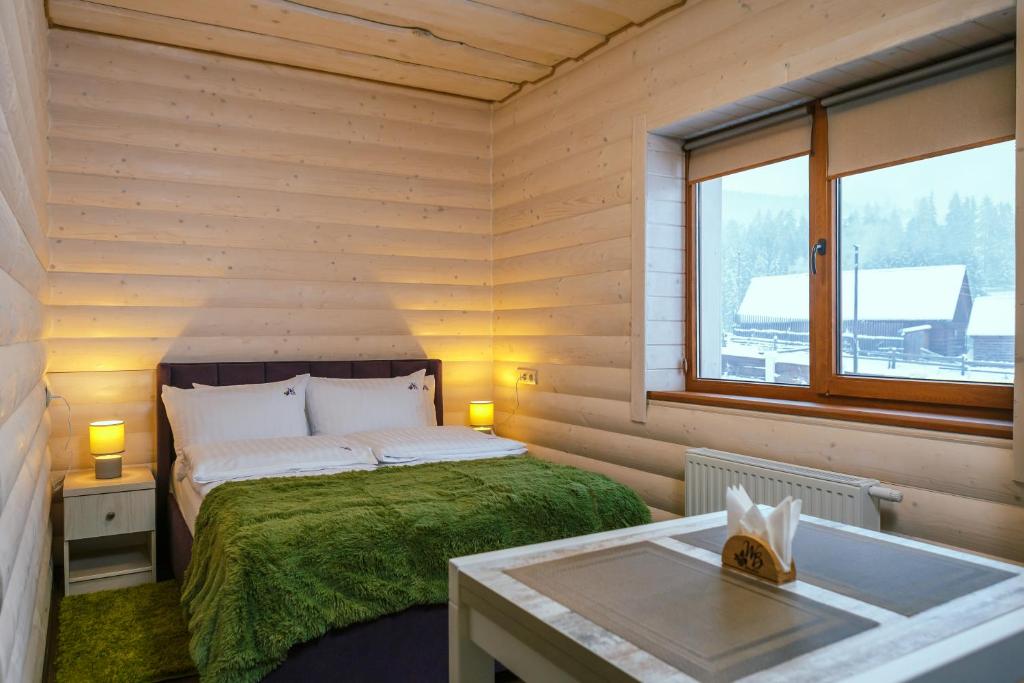 Postel nebo postele na pokoji v ubytování Whiteberry Studio