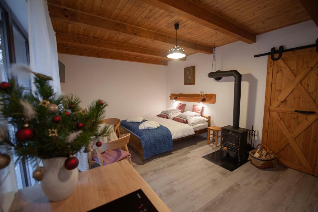Postel nebo postele na pokoji v ubytování Apartmán Stodola1 Harrachov