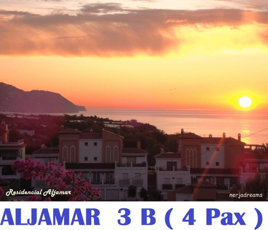 una puesta de sol sobre una ciudad con las palabras alkanar bjc en ALJAMAR 3B ( 4 Pax ), en Nerja