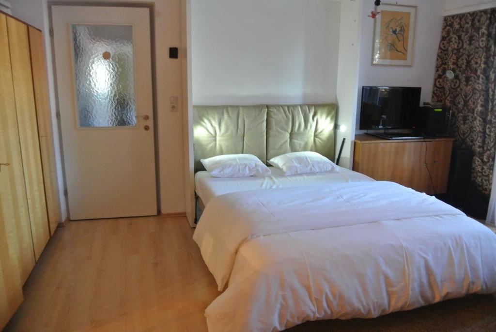 Posteľ alebo postele v izbe v ubytovaní Antoni Apartements