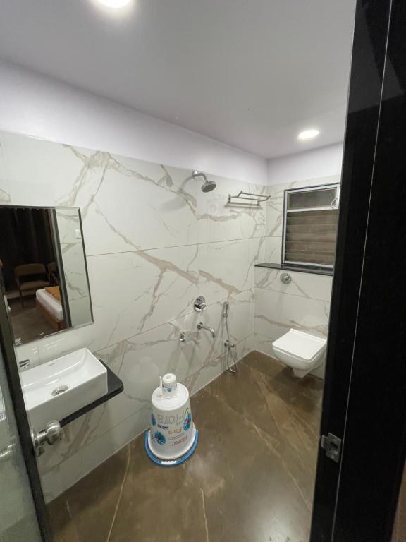 Koupelna v ubytování Hotel Vardhan