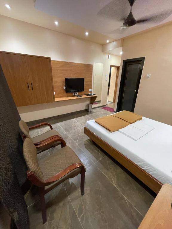 TV a/nebo společenská místnost v ubytování Hotel Vardhan