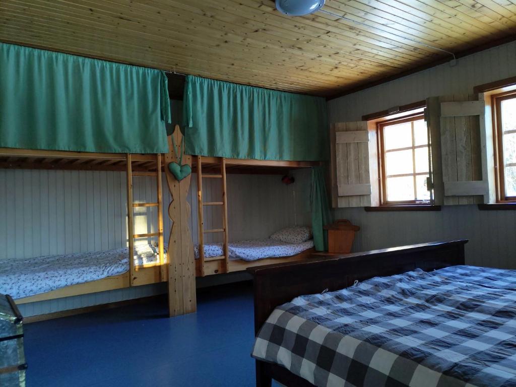 מיטה או מיטות בחדר ב-Mieps Huset Dalarna Holiday