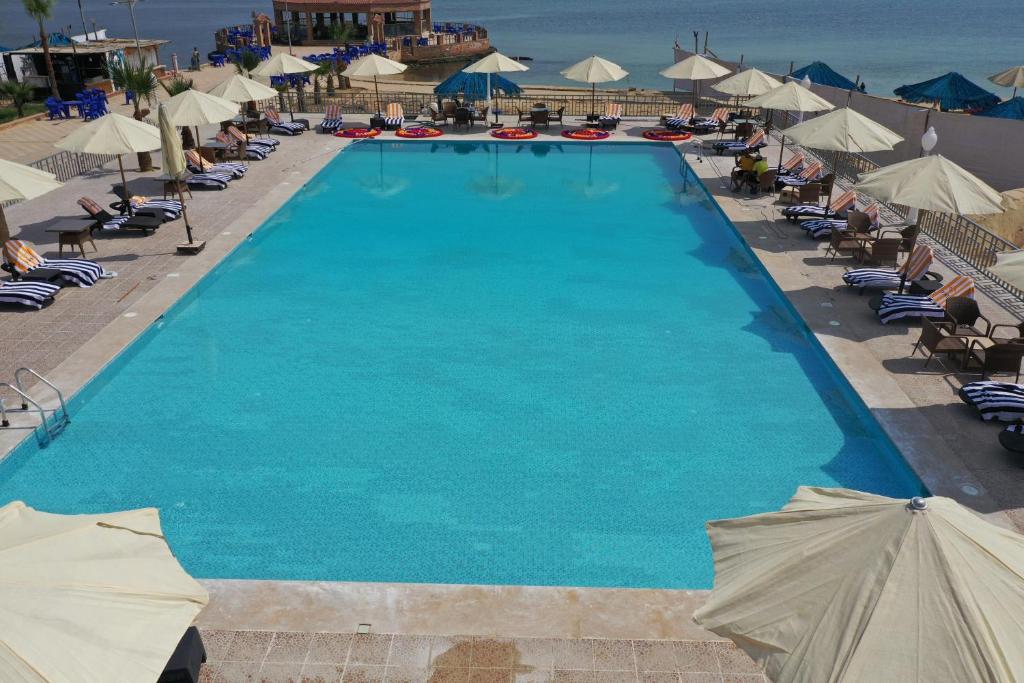 The swimming pool at or close to Jewel Fayed Hotel