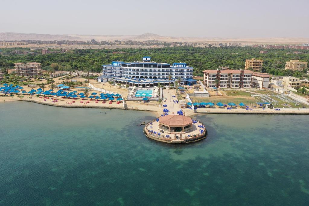 an aerial view of a resort in the water at Jewel Fayed Hotel in Fayed