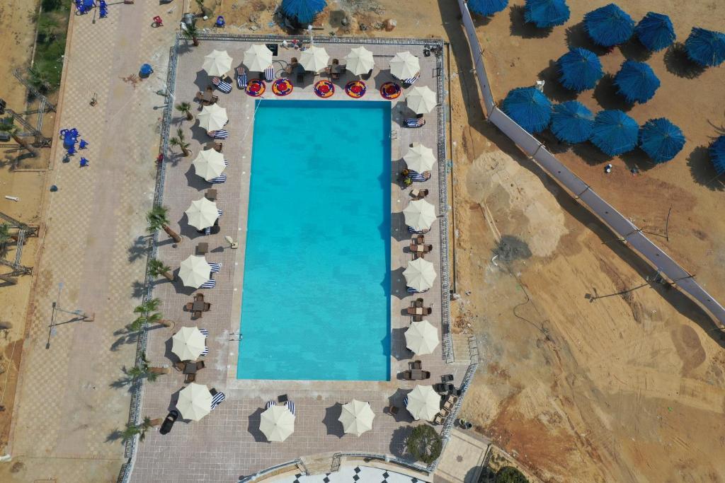 The swimming pool at or close to Jewel Fayed Hotel