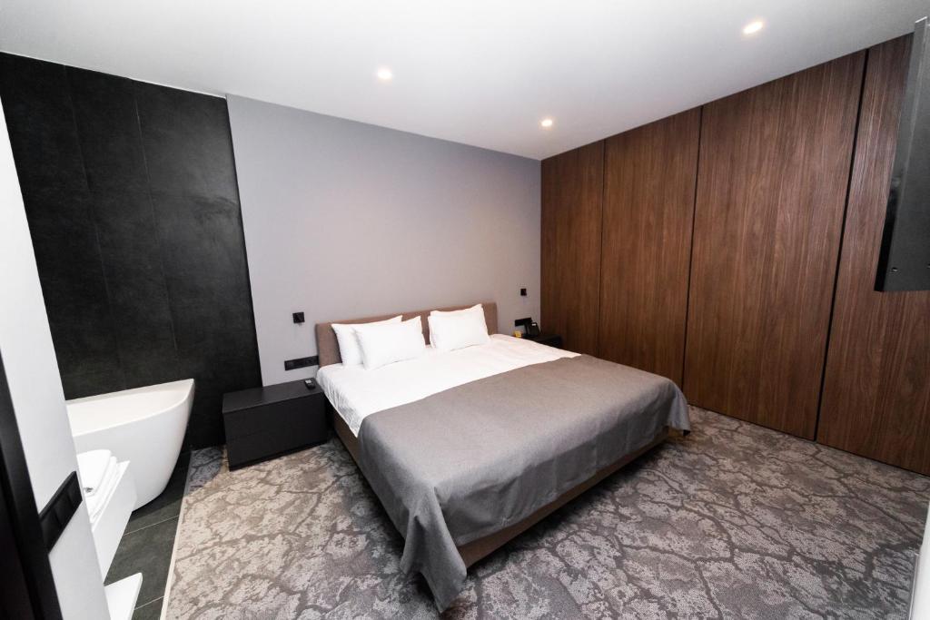 Postel nebo postele na pokoji v ubytování SMALL HOTEL