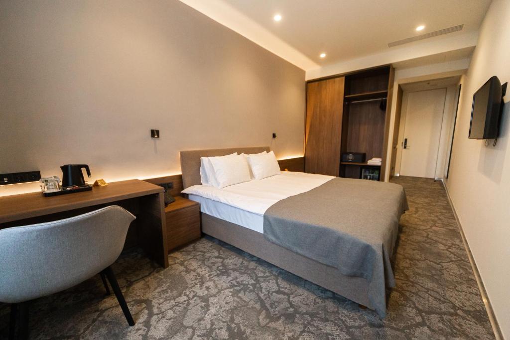 TV a/nebo společenská místnost v ubytování SMALL HOTEL