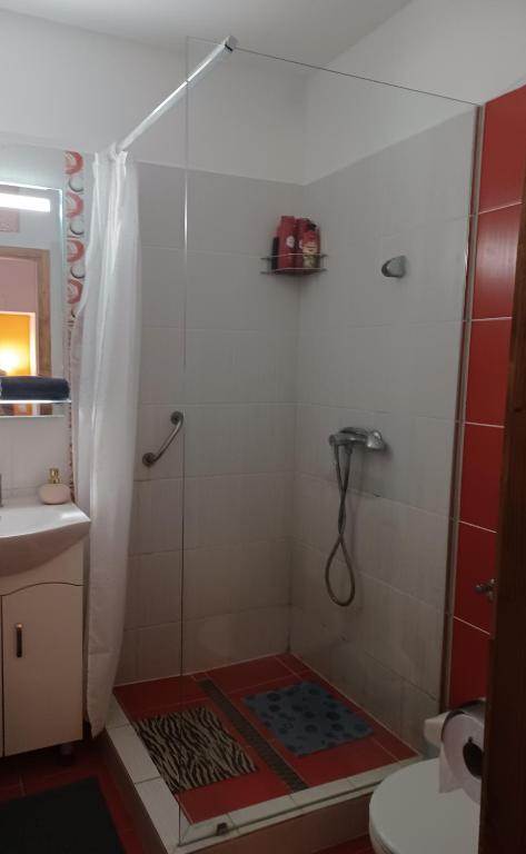 Kúpeľňa v ubytovaní Éva Apartmanház