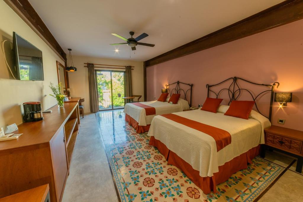 Cama o camas de una habitación en Hotel Meson del Marques