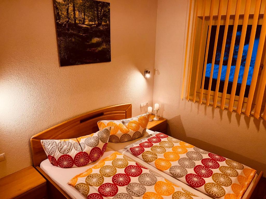 Posteľ alebo postele v izbe v ubytovaní Ferienwohnung Petter