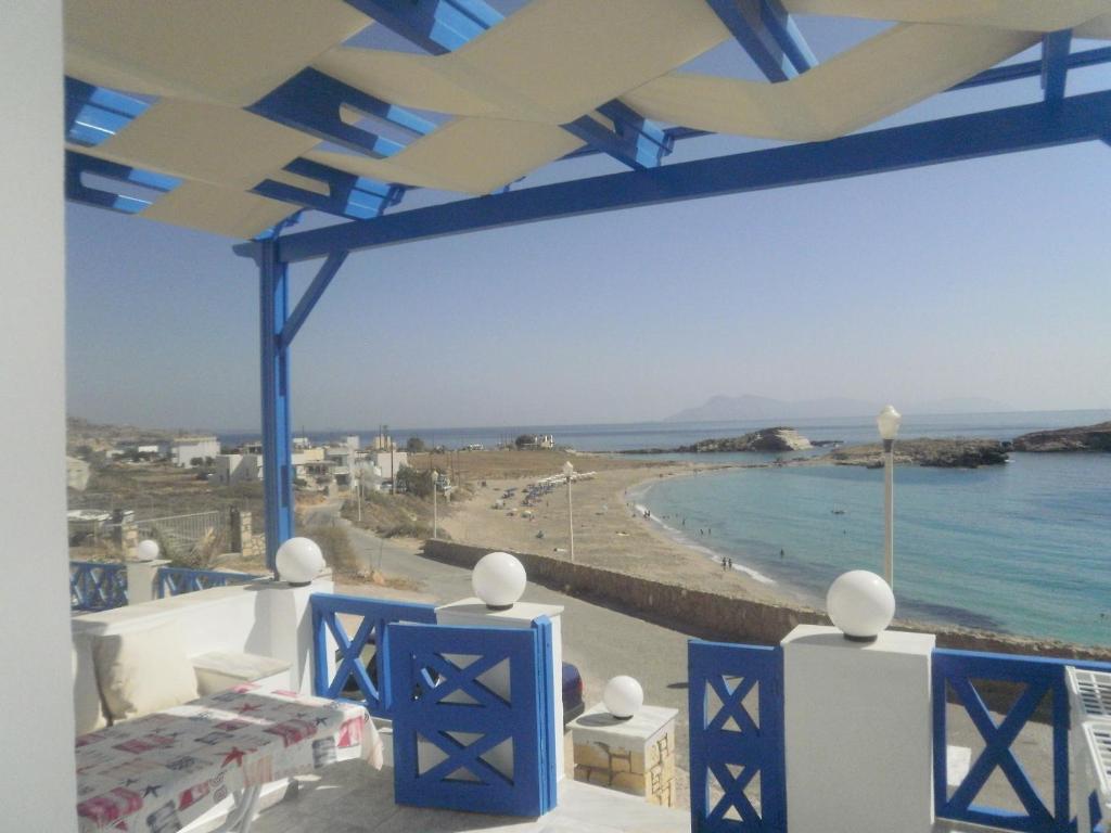 a view of the beach from a building at Blue and White Studios & Apartments in Lefkos Karpathou