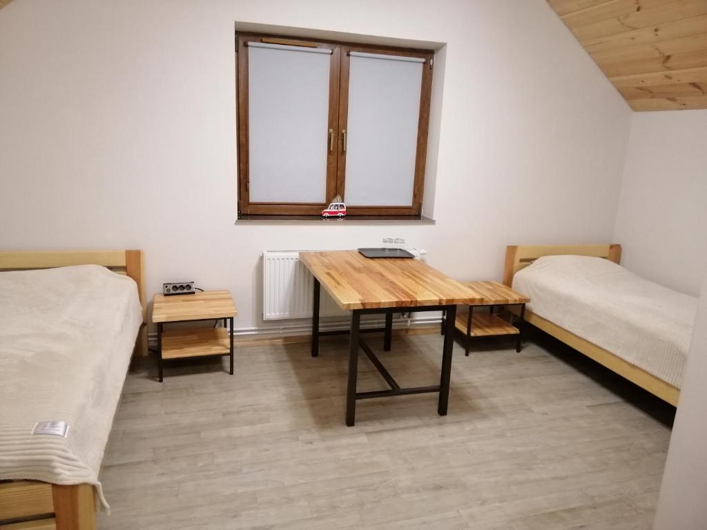 Cama ou camas em um quarto em Пансіон АГАВА