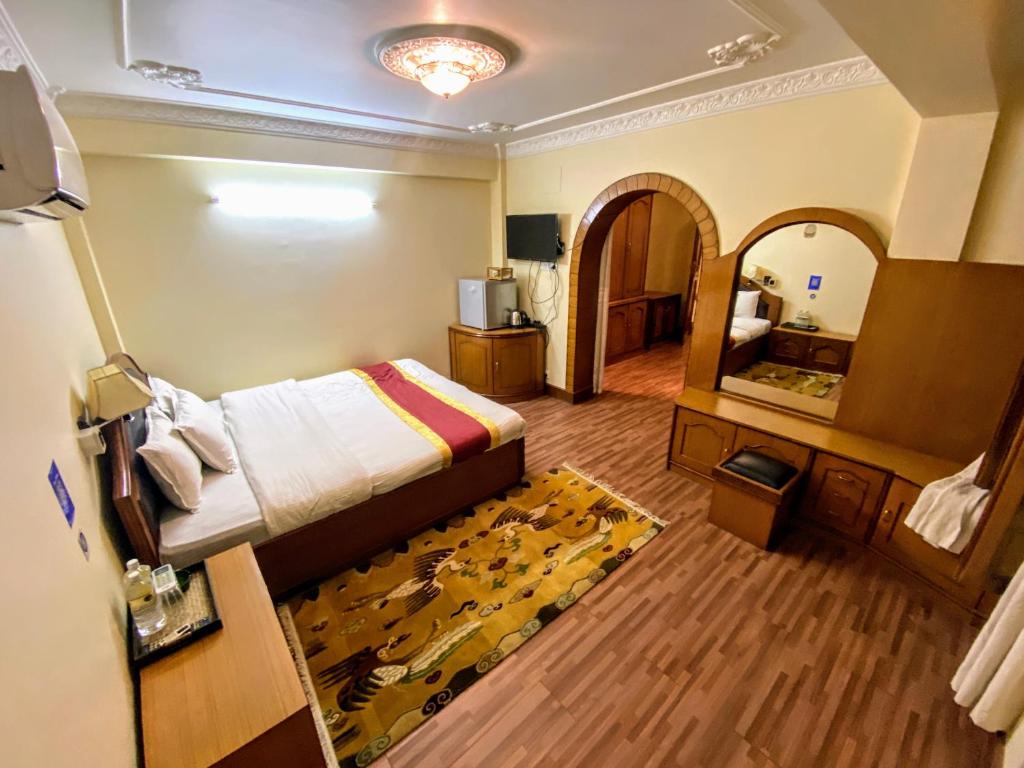 Postel nebo postele na pokoji v ubytování Hotel Bodhiz