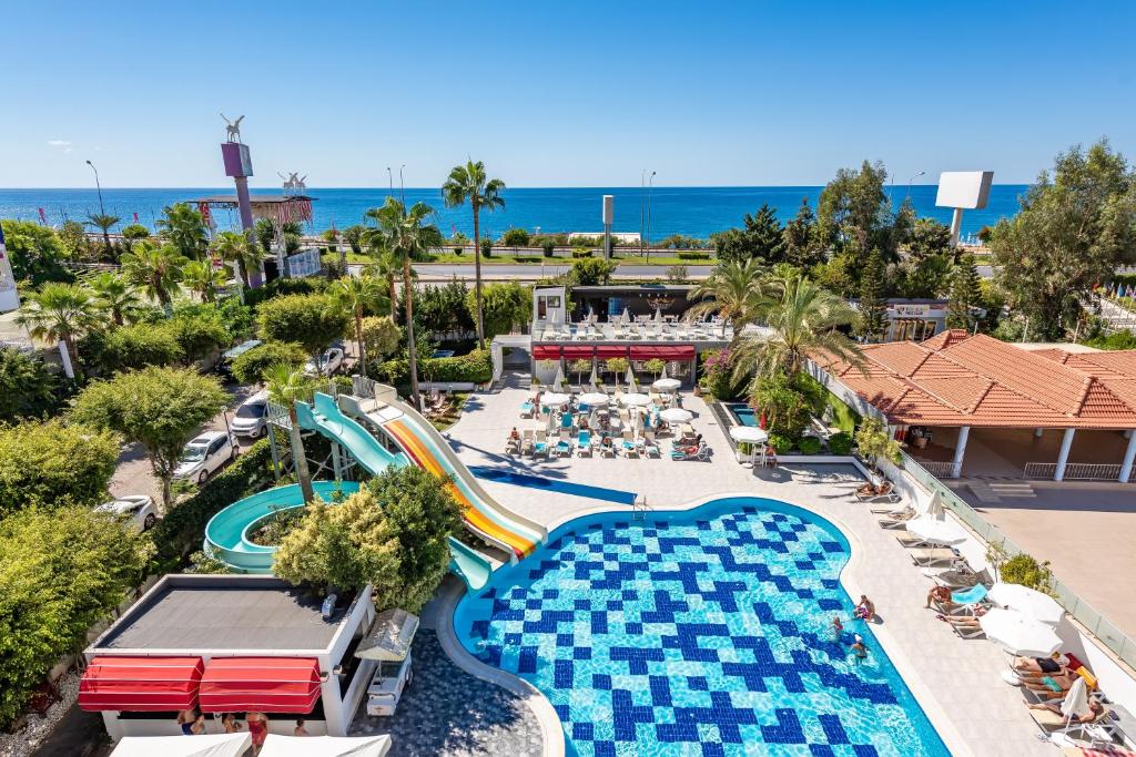 an aerial view of a pool at a resort at White City Beach Adult Only in Konaklı