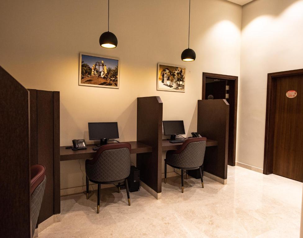TV a/nebo společenská místnost v ubytování ROZANA HOTEL