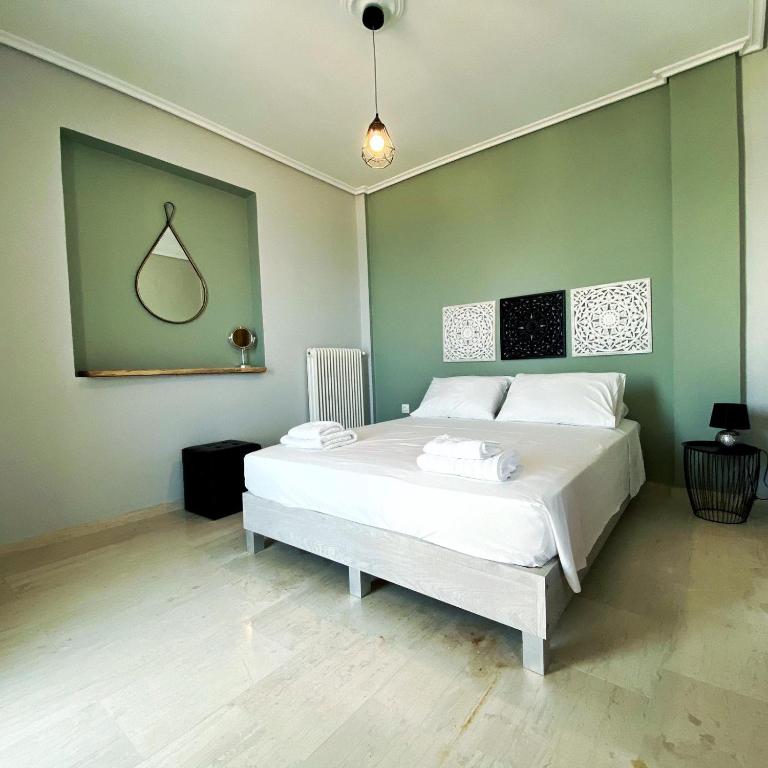 Posteľ alebo postele v izbe v ubytovaní Akakia Panoramic Villa