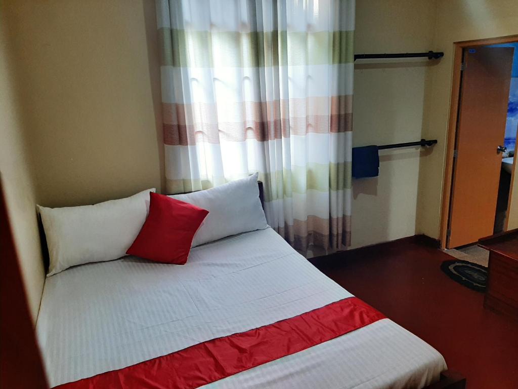Postel nebo postele na pokoji v ubytování Kande Gedara Resort (කන්දෙ ගෙදර)