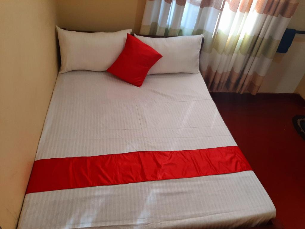 Postel nebo postele na pokoji v ubytování Kande Gedara Resort (කන්දෙ ගෙදර)