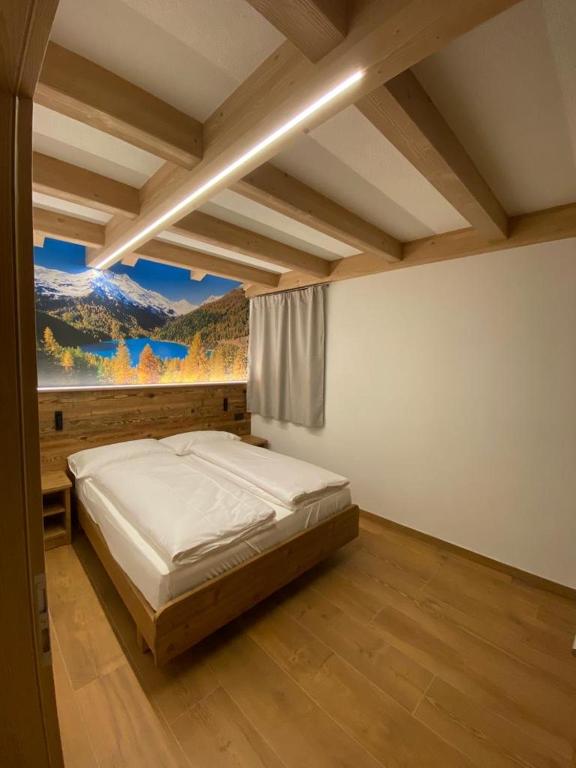 Postel nebo postele na pokoji v ubytování B&B el Benel
