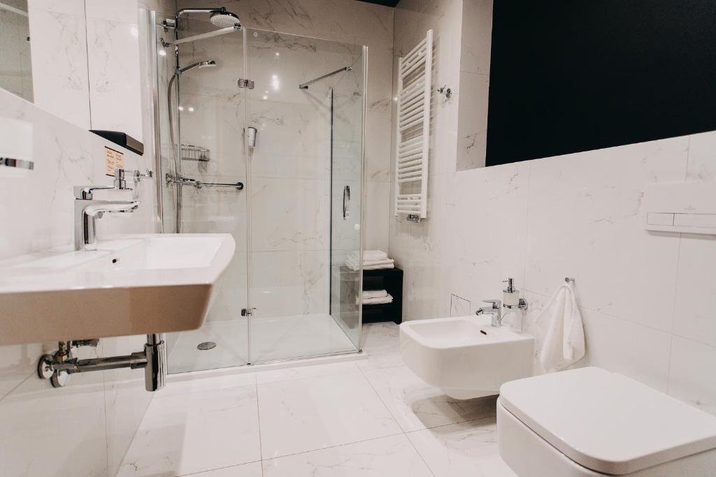 Kúpeľňa v ubytovaní Hotel Szara Willa