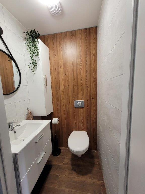 Kúpeľňa v ubytovaní Apartamenty Promyk Wisełka