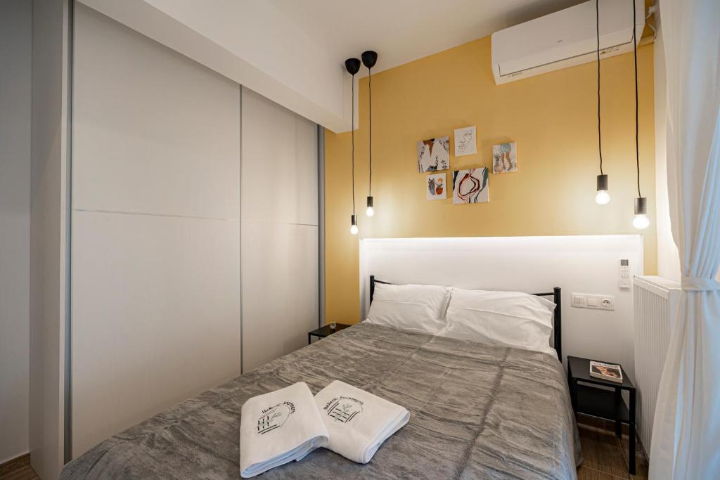 Posteľ alebo postele v izbe v ubytovaní Calliope Apartment