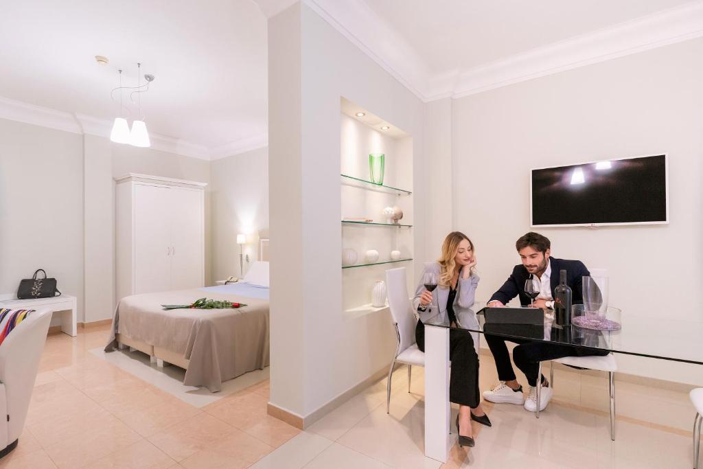 TV a/nebo společenská místnost v ubytování Victoria Palace Hotel & Zen Wellness