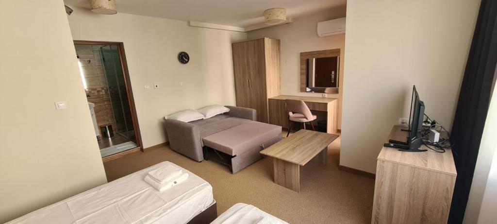 Postel nebo postele na pokoji v ubytování Hotel Geppy