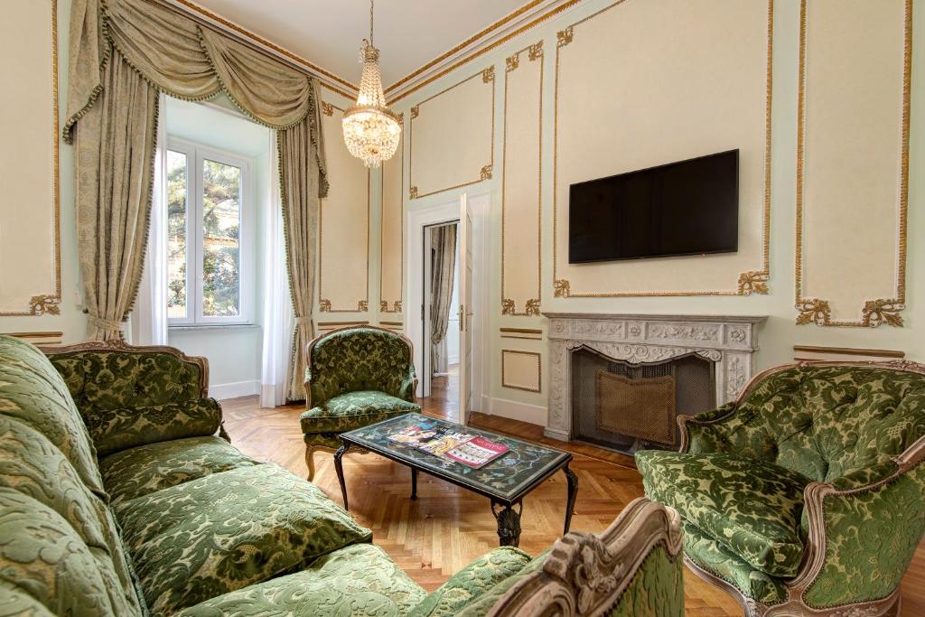 TV a/nebo společenská místnost v ubytování Hotel Quirinale