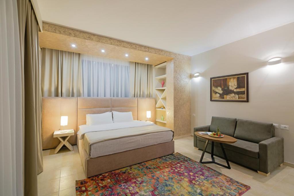 Postel nebo postele na pokoji v ubytování Horizont Hotel