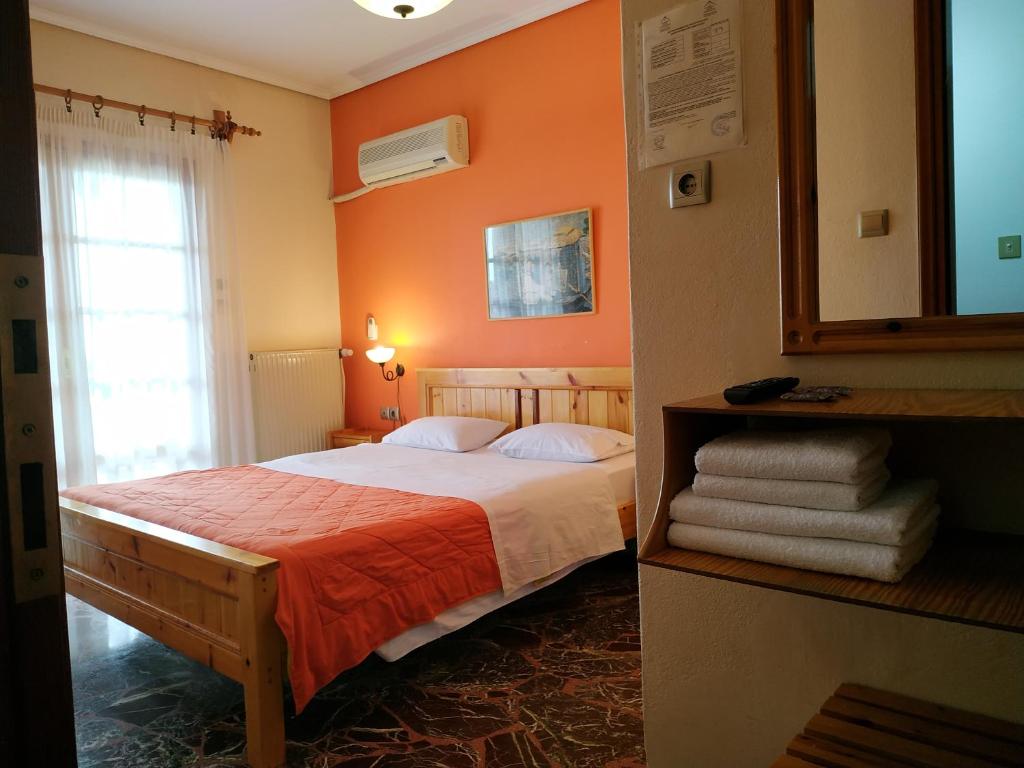 Postel nebo postele na pokoji v ubytování Pension Vergina