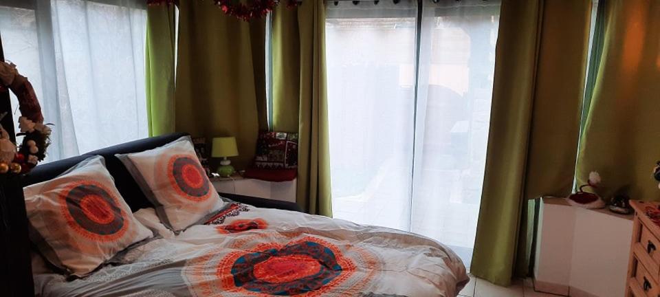 Postel nebo postele na pokoji v ubytování Oasis d'Alsace
