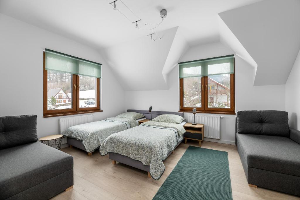 Posteľ alebo postele v izbe v ubytovaní Tylko Tu i Teraz- Sauna, Balia z jacuzzi, Bon turystyczny