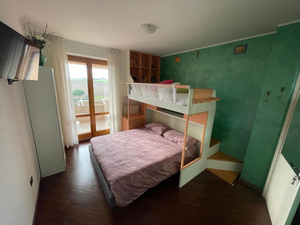 Posteľ alebo postele v izbe v ubytovaní Appartamento B&B Orizzonti