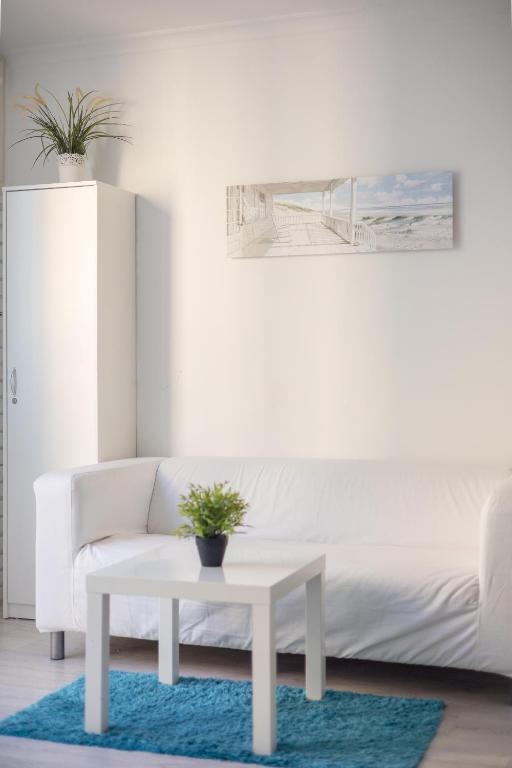 Część wypoczynkowa w obiekcie Rondo ONZ Business Apartment