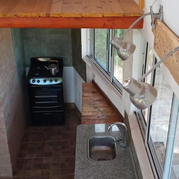Köök või kööginurk majutusasutuses Cosmos Tiny House