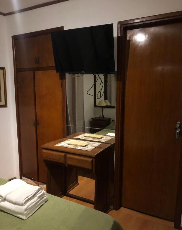 Postel nebo postele na pokoji v ubytování Wiener Haus Hotel