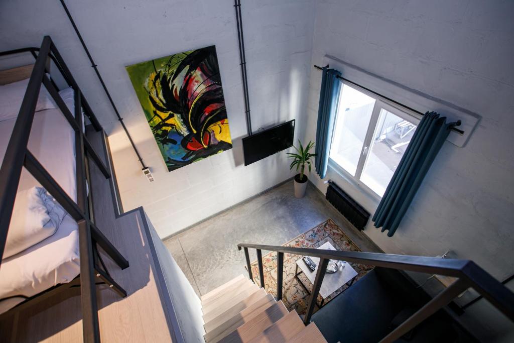 Postel nebo postele na pokoji v ubytování Campus Community A-Rooms