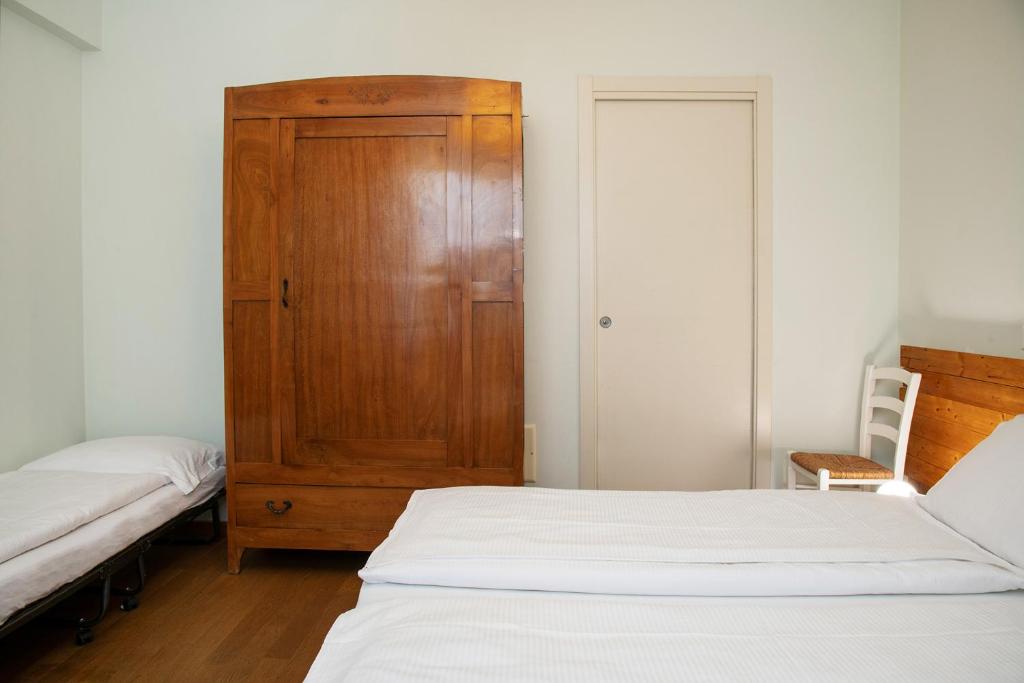 Postel nebo postele na pokoji v ubytování Via Verdi B&B