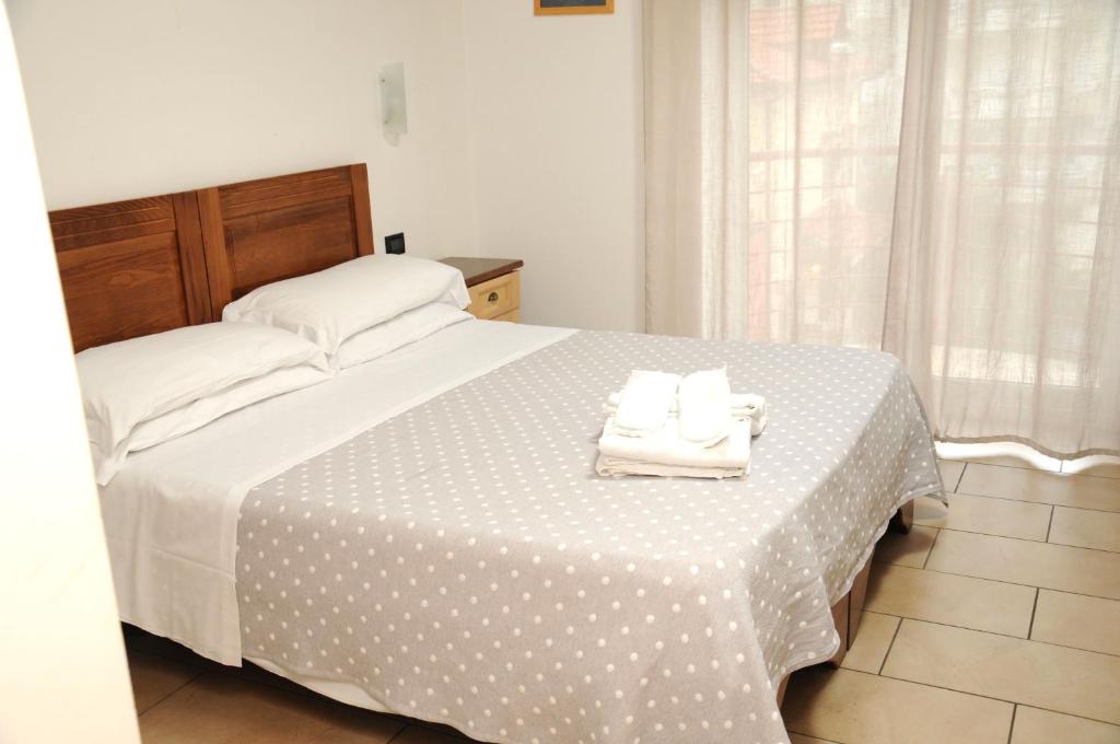 Postel nebo postele na pokoji v ubytování Hotel Fly