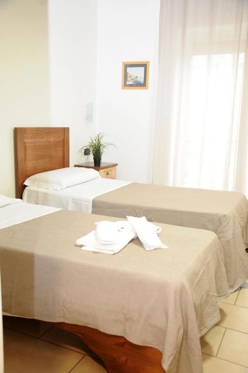 Postel nebo postele na pokoji v ubytování Hotel Fly