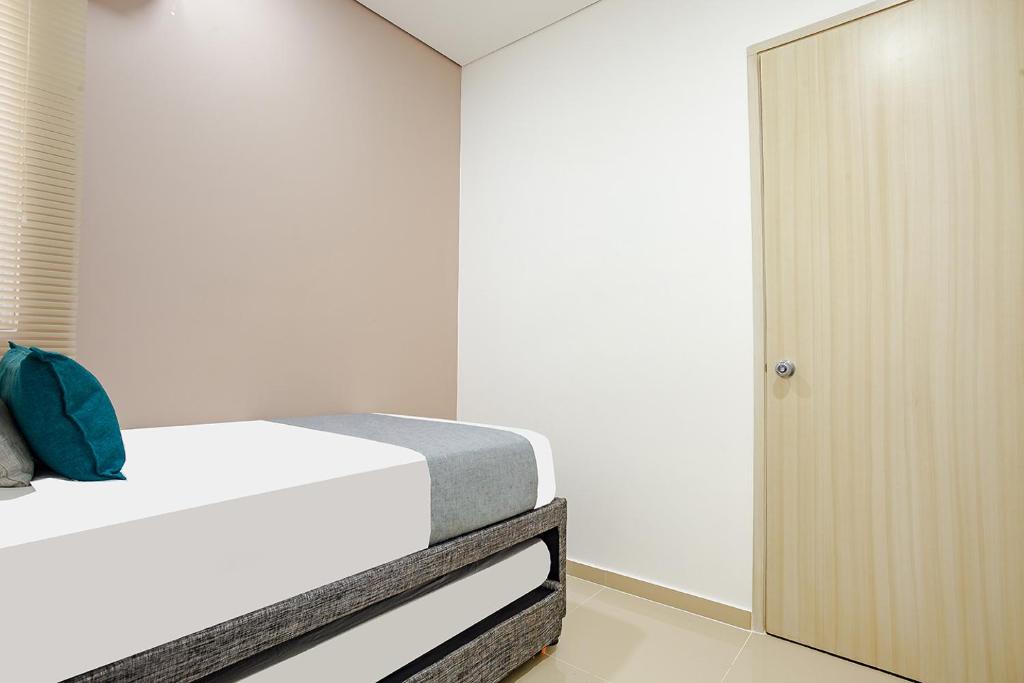 Postel nebo postele na pokoji v ubytování Ayenda Montepinares