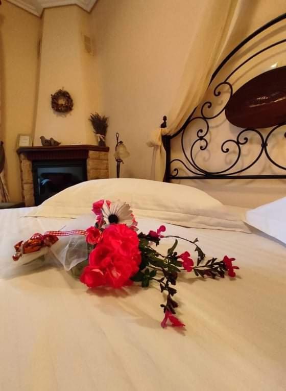 Postel nebo postele na pokoji v ubytování Valentini Guesthouse