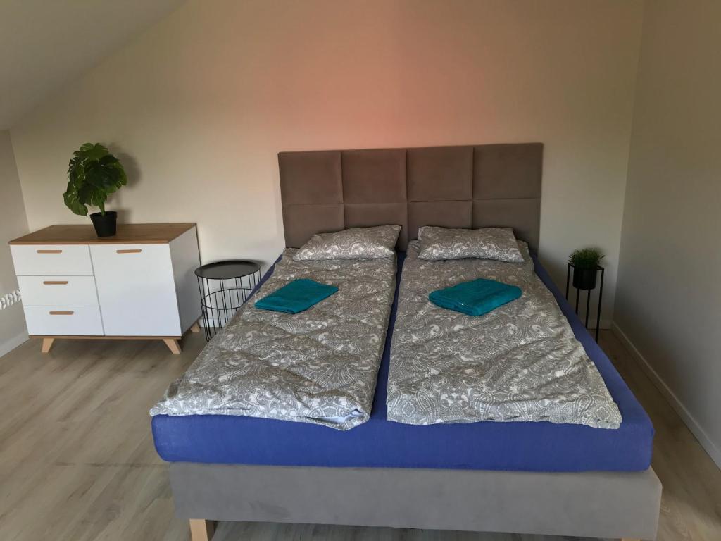APARTAMENTY MONTANIA WISŁA客房内的一张或多张床位