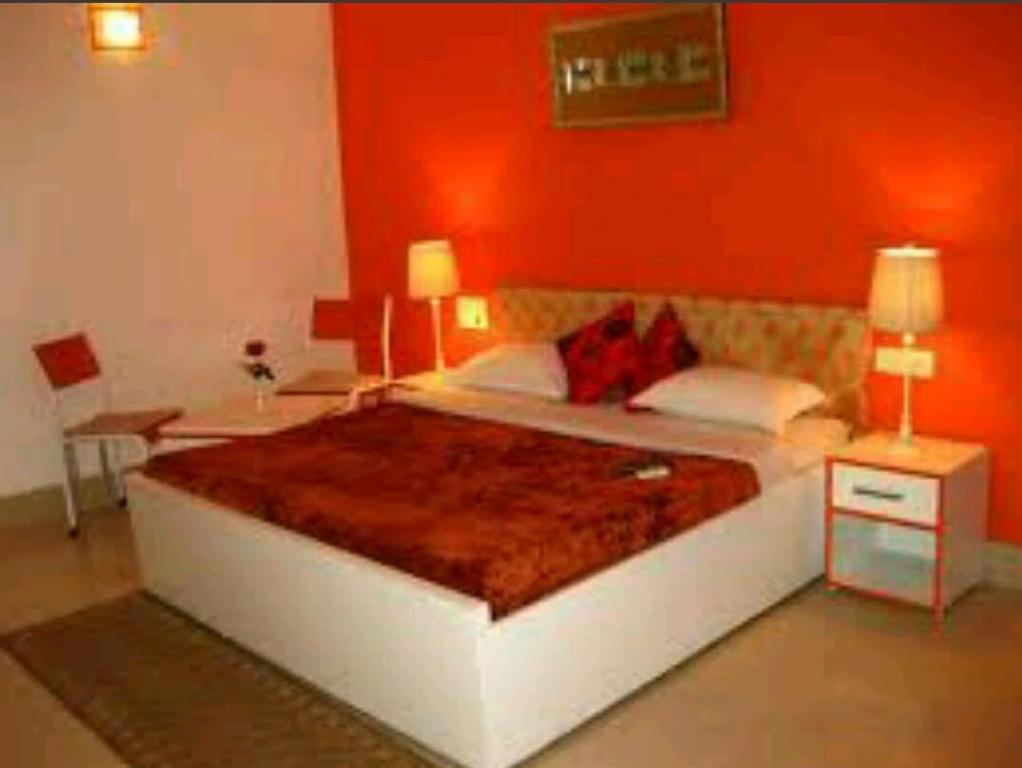 Katil atau katil-katil dalam bilik di Hotel travel inn